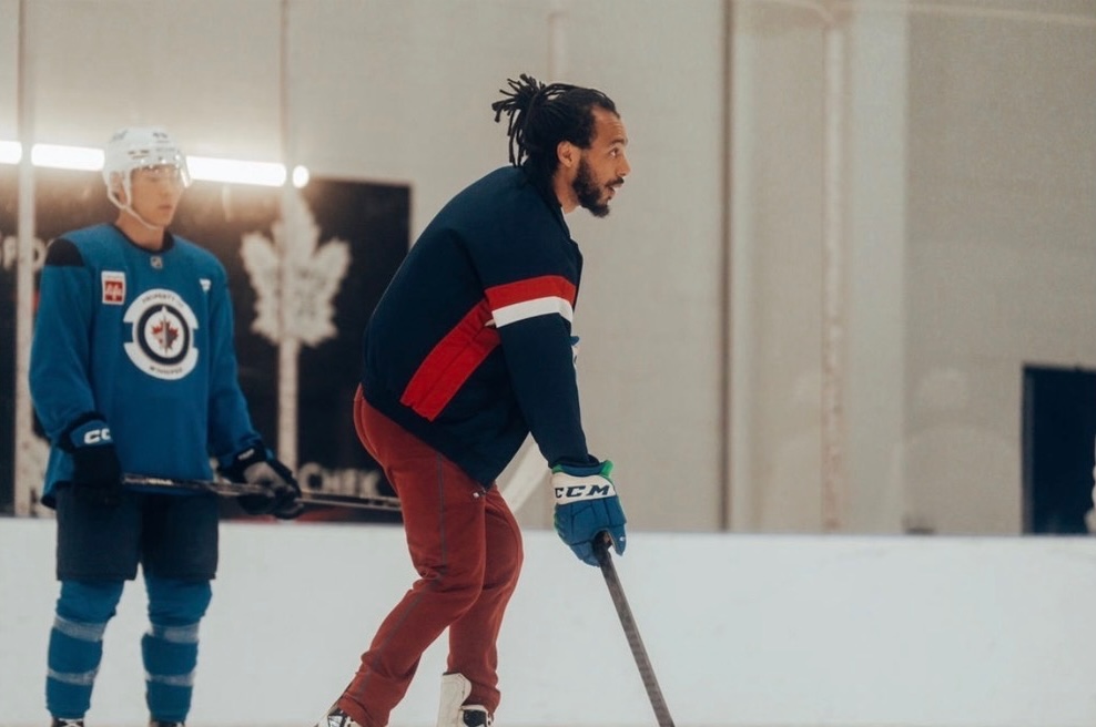 Josh Ho-Sang coaching on the ice